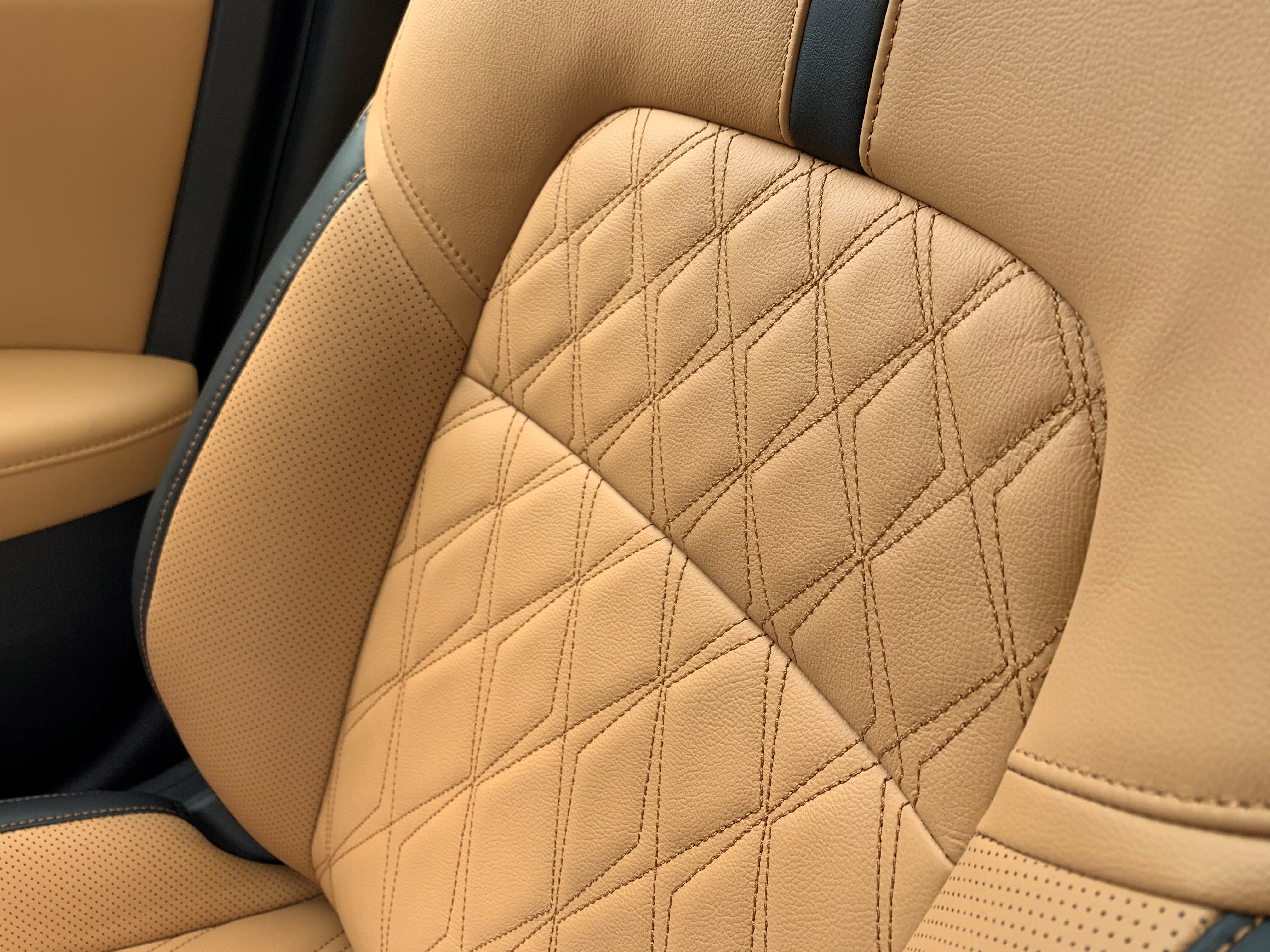 EMBED 2 Nissan Sentra seat closeup.jpg