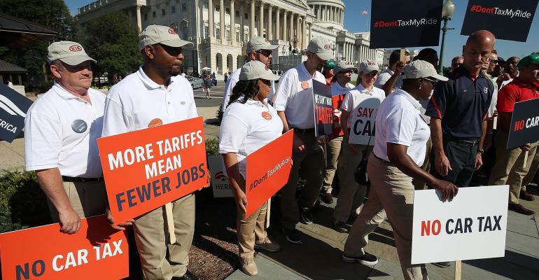 Auto workers protest Trump Admin.’s proposed auto-industry tariffs in July in Washington.