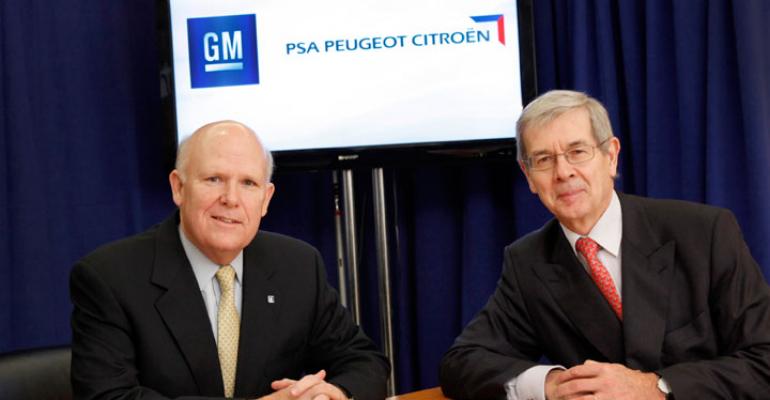 GM CEO Akerson left and PSA Chairman Varin in New York for announcement of tieup