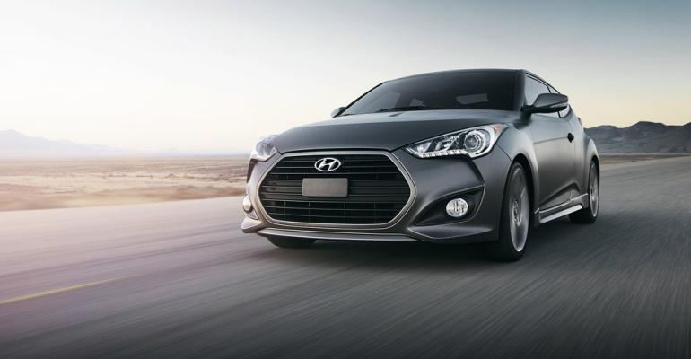 Hexagonal grille distinguishes Turbo from standard Veloster