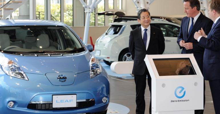 Nissan COO Shiga left with UK Prime Minister David Cameron April 10 in Yokohama Japan