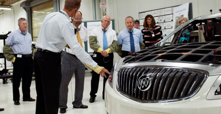 GM Chairman and CEO Dan Akerson tours Orion Twp MI assembly plant with board members ahead of today39s annual meeting