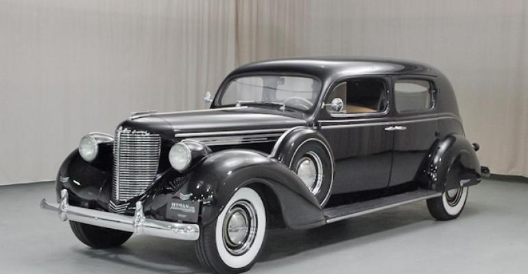 Staggered work system used to build vehicle bodies like this 1938 Chrysler Custom Imperial comes to an end and Briggs Manufacturing Co
