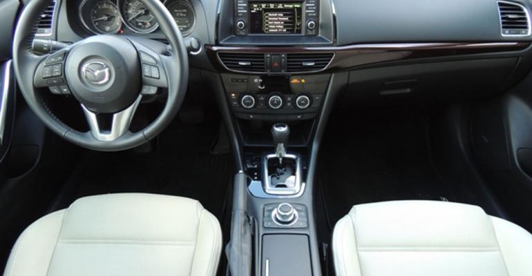 Whitealmond seats burgundyhued instrumentpanel trim add luxury touch to rsquo14 Mazda6