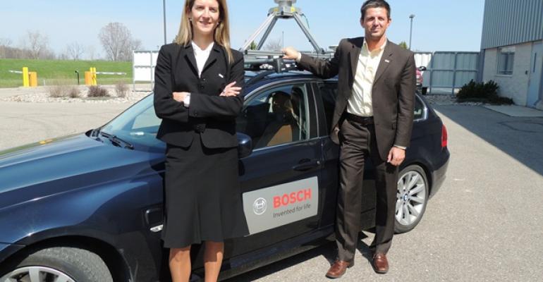 Bosch39s MariaBelen Aranda Colas left and Kay Stepper demonstrate highly automated concept car at Flat Rock MI test track