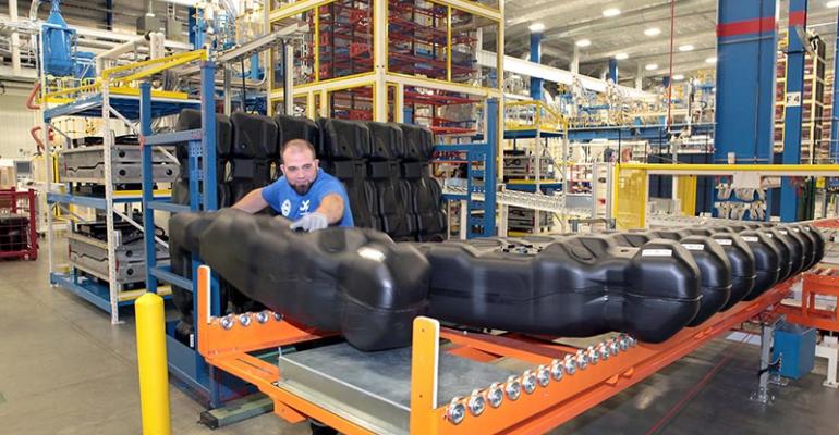 Inergy employee prepares fuel tank for shipping from new plant in Huron Township MI