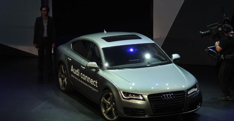 Audi Connect concept car rolls out autonomously on stage during CES keynote speech without anyone inside
