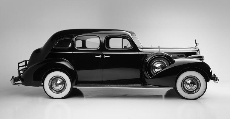 To stimulate sales Packard cuts prices