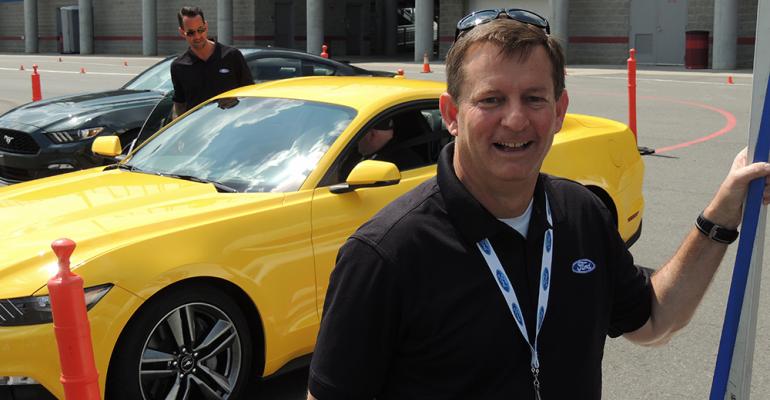 Mustang Vehicle Engineering Manager Tom Barnes talks to journalists in Charlotte NC during brief rides in allnew pony car