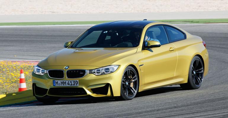 Allnew engine emphasis on lightweight materials and Austin Yellow Metallic paint distinguish M4 coupe