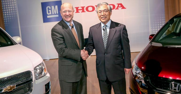 Former GM Vice Chairman Steve Girsky and Honda Executive Vice President Tetsuo Iwamura announce FCEV partnership in July 2013