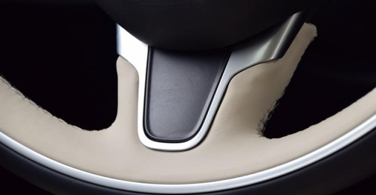 Twotone IndigoLinen leatherwrapped steering wheel handstitched