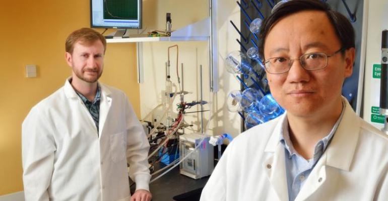 Virginia Tech professor Percival Zhang right with doctoral graduate Joe Rollin