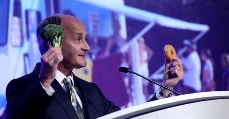 Honda dealer Forrest McConnell III uses broccoli and doughnut to illustrate demand for alternative powertrains