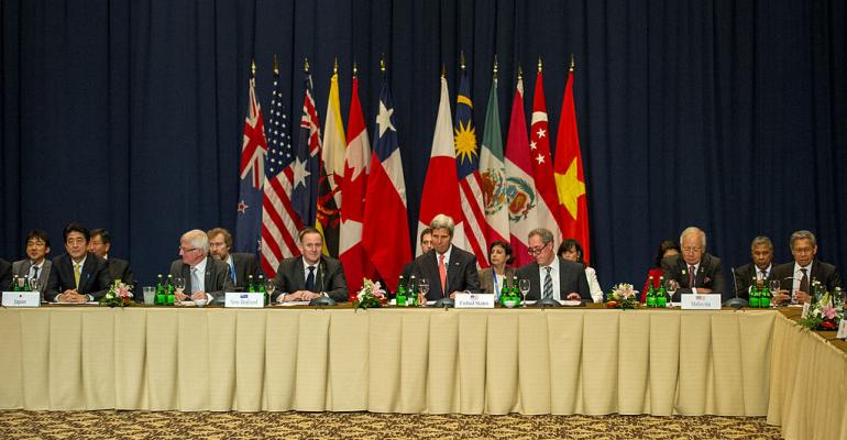 US Secretary of State John Kerry center participates in 2013 TPP meeting