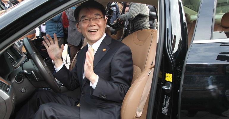 Kang Hoin Korean Minister of Land Infrastructure and Development experiences ldquohandsfreerdquo driving capability of Genesis Autonomous during test drive