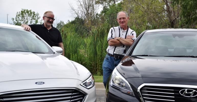 Editor Drew Winter left drove Ford Fusion Energi to MBS while Editor Steve Finlay drove Hyundai Sonata PHEV