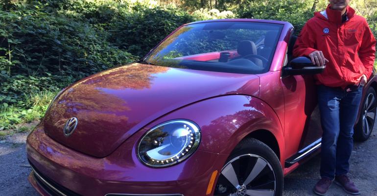 Lear with VWrsquos new pink Beetle convertible