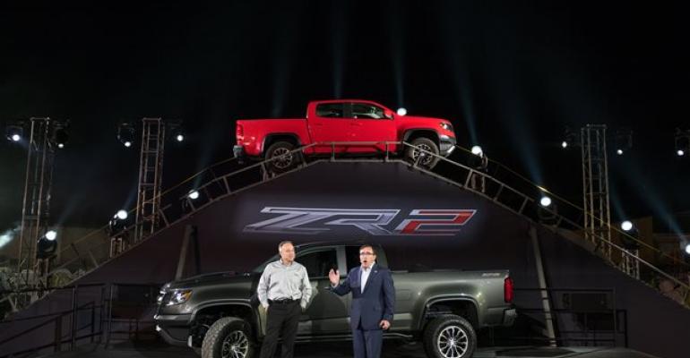 GM North America President Alan Batey right Chevy Performance Executive Mark Dickens with Colorado ZR2 offroader in Los Angeles