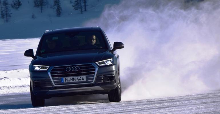 Audi Q5 drifts around frozen lake in Arjeplog Sweden with quattro ultra 