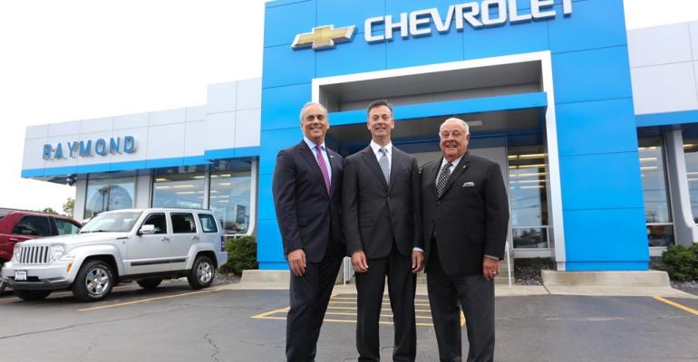 Mark Scarpelli right with brother Ray Scarpelli and father Raymond Scarpelli Sr at the family Chevy Store 
