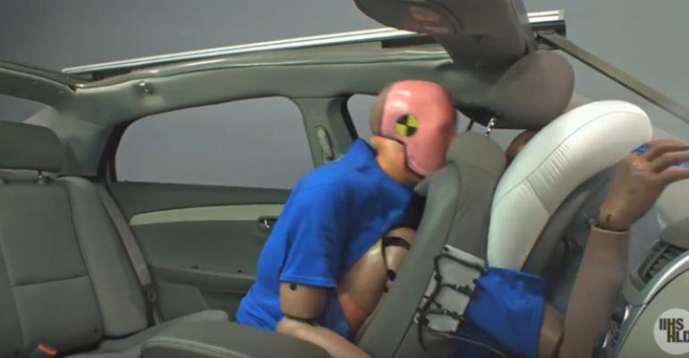 Simulation of 35mph frontal crash with unbelted dummy in back seat