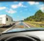 Augmentedreality features such as arrowheads appear to become part of road as they guide driver