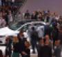 Lincoln Continental surrounded by press at NAIAS
