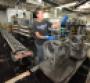 Chrysler worker at Kokomo IN plant assembles valve bodies 