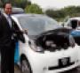 GreenTech Malaysia CEO Ahmad Hadri Haris with Mitsubishi iMiEV