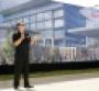 Toyota North America CEO Lentz in front of Plano HQ rendering