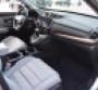 Snowwhite leather faux wood accents among luxurylike touches in winning CRV