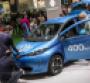 Visitors to Barcelona auto show examine Renault Zoe 40 electric vehicle