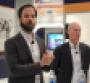 Schnabl left and Gnauck discuss new software product conquestMastermind at the 2018 NADA Convention and Exposition in Las Vegas