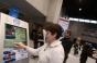 Chicago show visitor uses information kiosk at McCormick Place