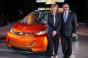 GM CEO Barra GM North American President Alan Batey with Chevy Bolt