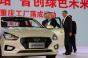 Hyundai Vice Chairman Chung front right inspects vehicle at Hyundairsquos fifth China plant with Chongqing Mayor Zhang front left