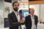 Schnabl left and Gnauck discuss new software product conquestMastermind at the 2018 NADA Convention and Exposition in Las Vegas